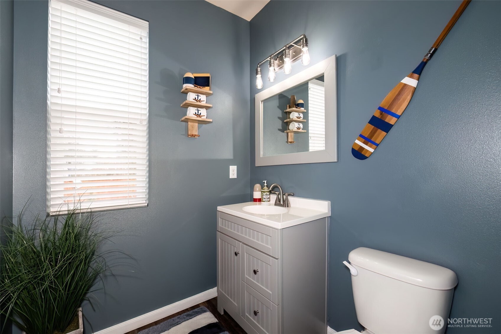 4189 Southwest Colbert Way Port Orchard, WA 98367 - Photo 18 of 38 a bathroom with a toilet a sink and a window