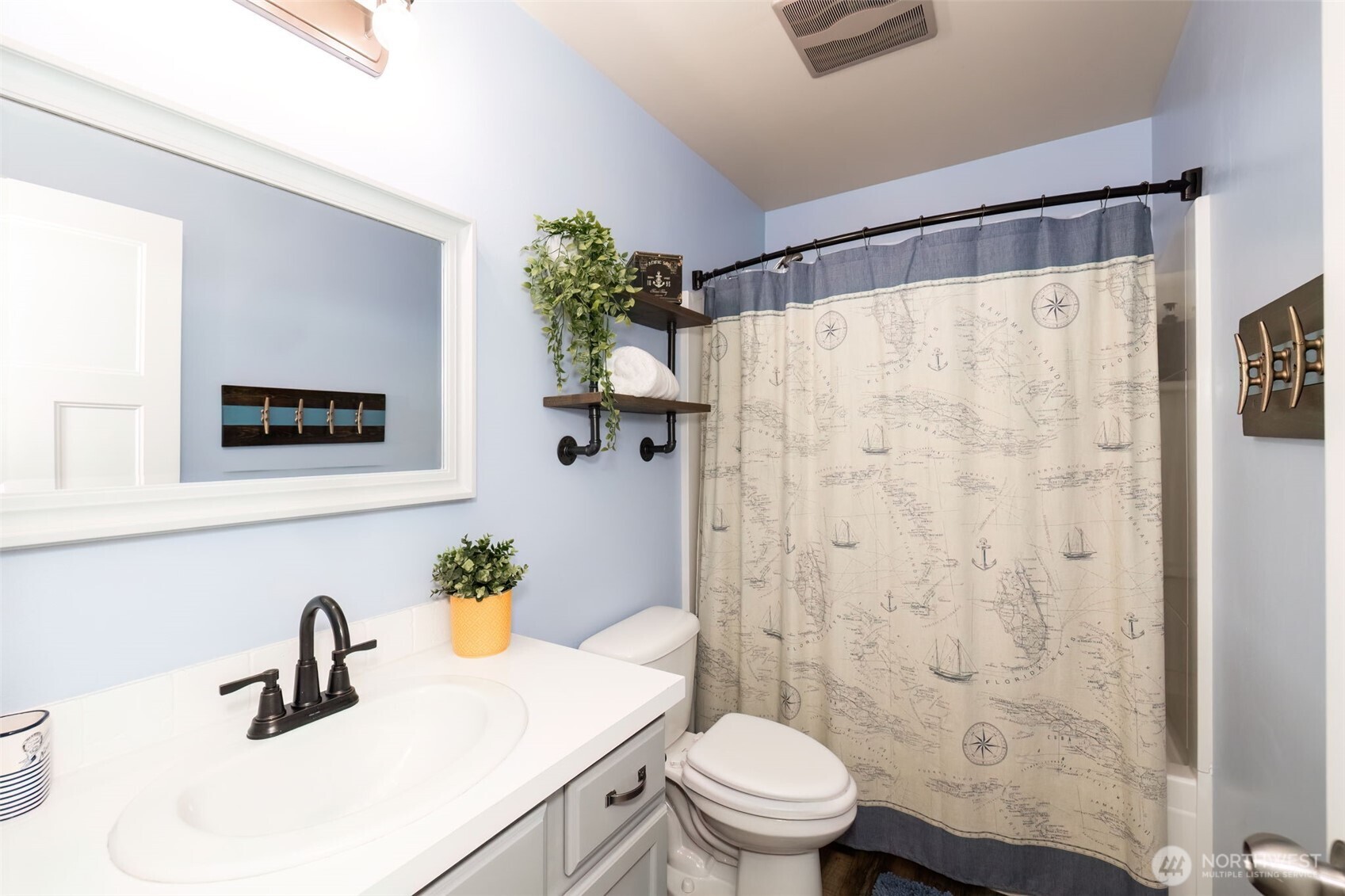 4189 Southwest Colbert Way Port Orchard, WA 98367 - Photo 29 of 38 a bathroom with a sink toilet and shower