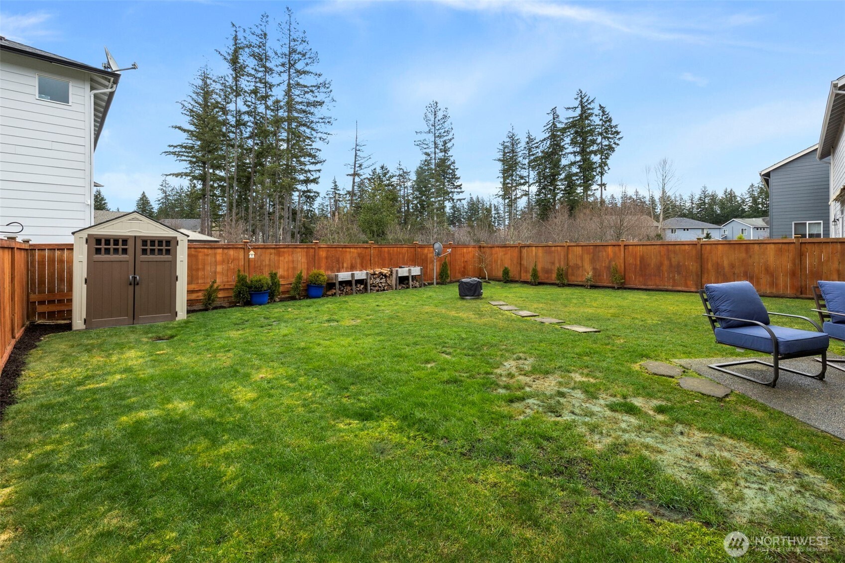 4189 Southwest Colbert Way Port Orchard, WA 98367 - Photo 32 of 38 a view of a backyard with a sitting area