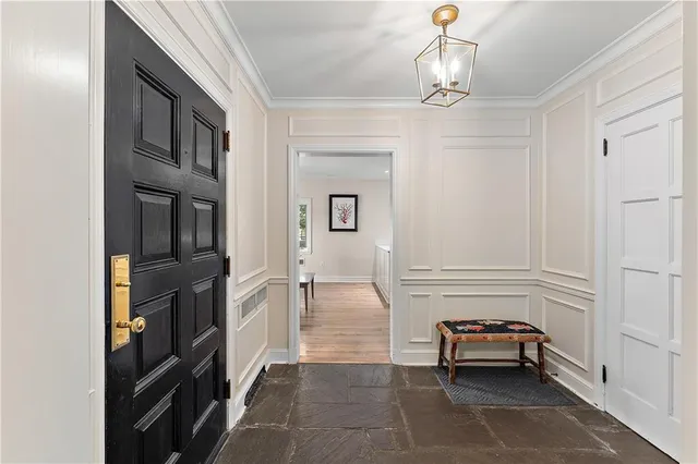 a bathroom with a sink a mirror and a shower