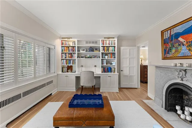 a living room with furniture and a rug