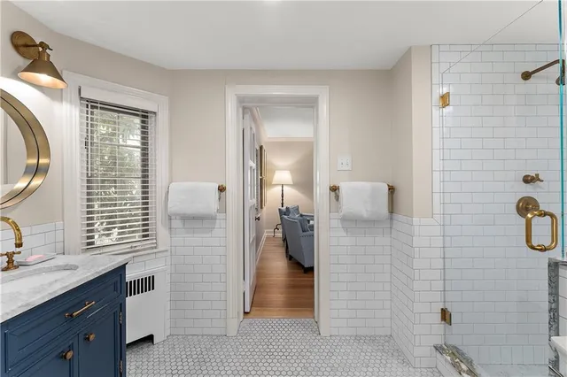 a bathroom with a sink and a mirror