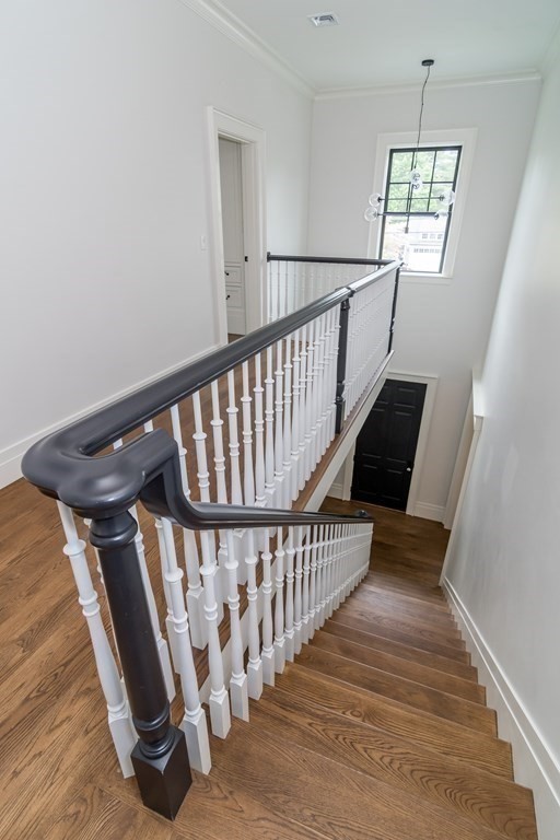 274 Manning Street Needham, MA 02492 - Photo 13 of 26 a view of entryway with wooden floor