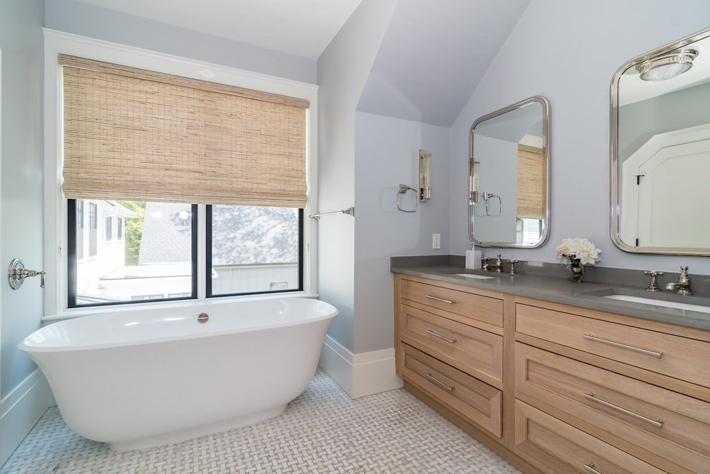 274 Manning Street Needham, MA 02492 - Photo 16 of 26 a spacious bathroom with a tub double sink and mirror