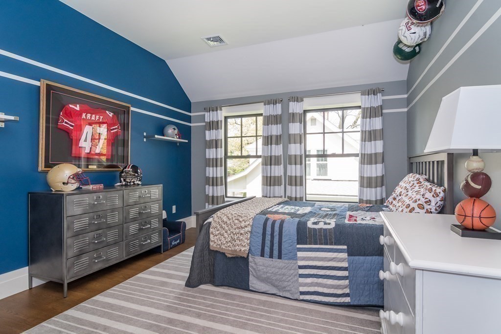 274 Manning Street Needham, MA 02492 - Photo 19 of 26 a living room with furniture and a flat screen tv