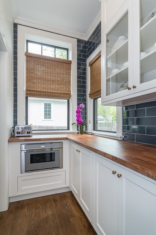 274 Manning Street Needham, MA 02492 - Photo 8 of 26 a kitchen with a sink and large window