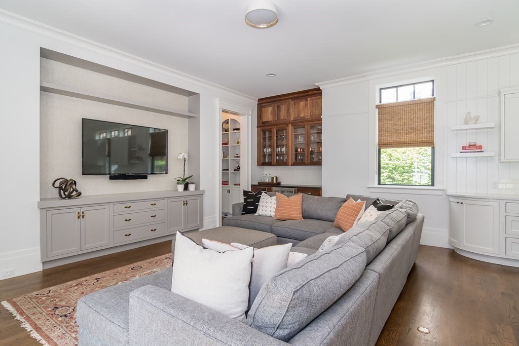 274 Manning Street Needham, MA 02492 - Photo 9 of 26 a living room with furniture and a flat screen tv
