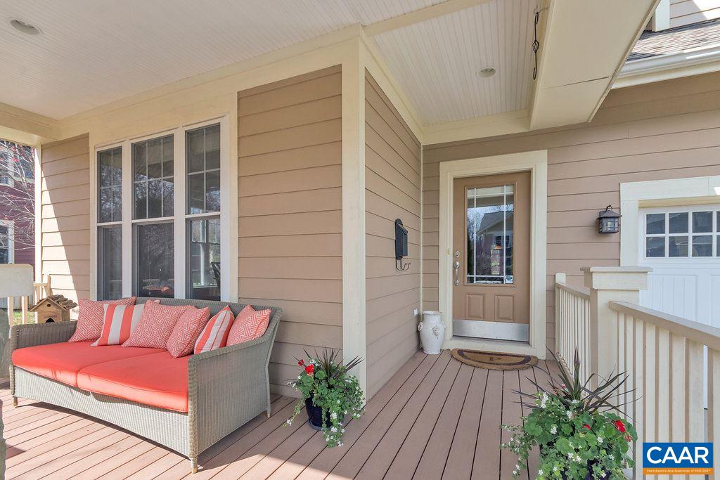 825 Village Road Charlottesville, VA 22903 - Photo 3 of 42 a outdoor space with patio the couches and a dining table with balcony view