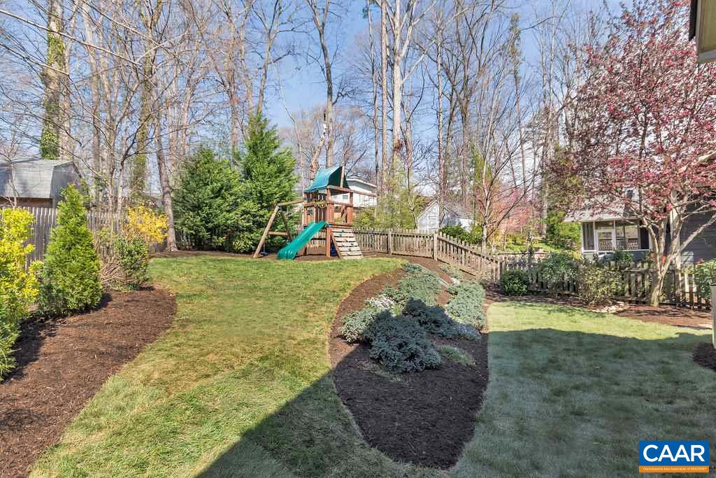 825 Village Road Charlottesville, VA 22903 - Photo 38 of 42 a view of a yard with plants and trees