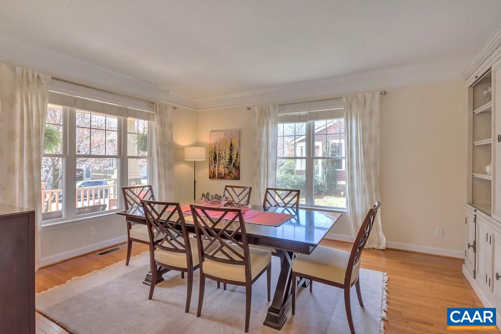 825 Village Road Charlottesville, VA 22903 - Photo 4 of 42 a view of a dining room with furniture and wooden floor