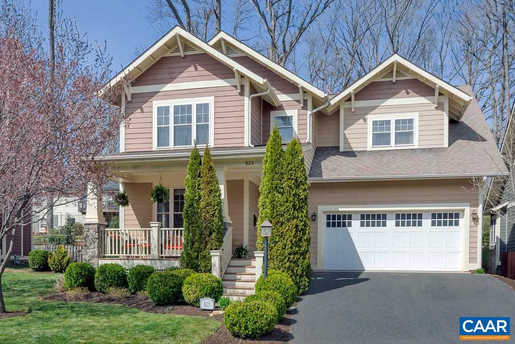 825 Village Road Charlottesville, VA 22903 - Photo 42 of 42 a front view of a house with a yard and trees