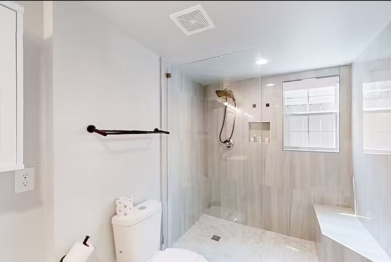 6325 Riverview Way, Unit ABCD Houston, TX 77057 - Photo 11 of 33 a bathroom with a shower and a toilet