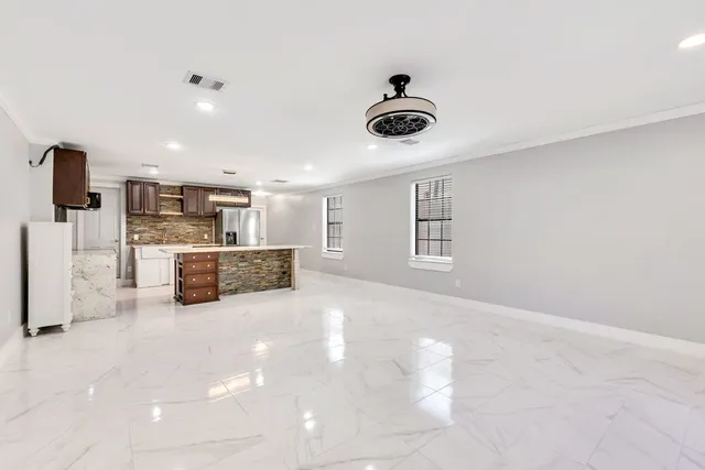 a view of kitchen and microwave