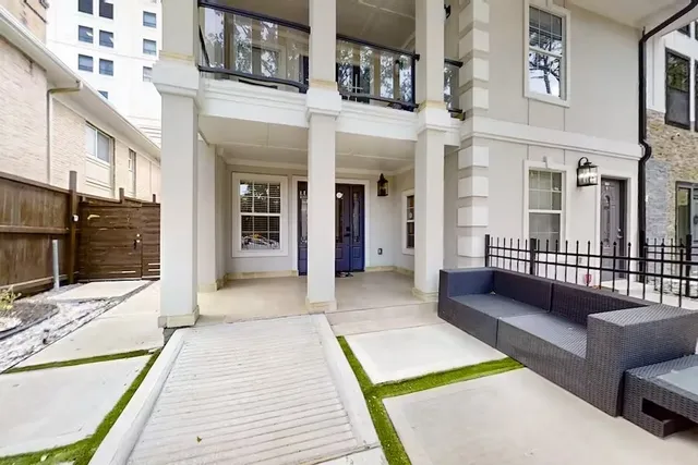 a view of a lobby with a lounge chair