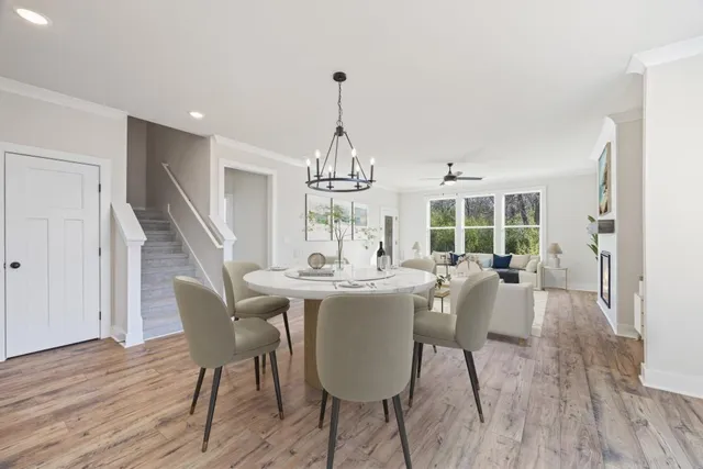 a living room with furniture and a table