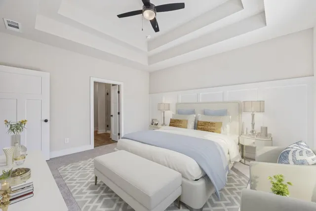 a bathroom with a granite countertop sink and shower
