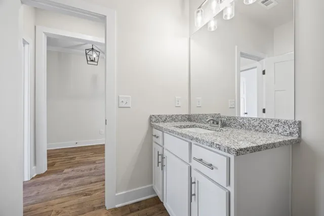 a view of staircase with white walls