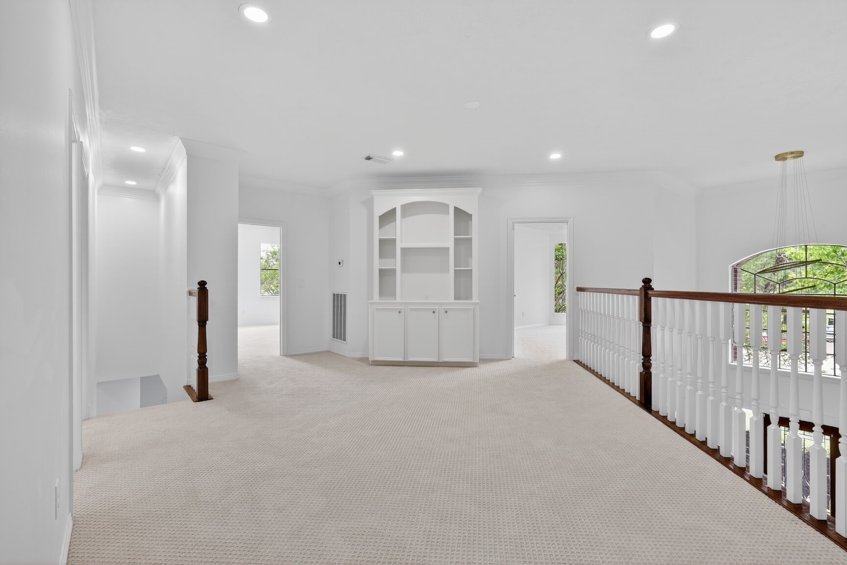 17519 Shelburne Lane Spring, TX 77379 - Photo 20 of 31 a view of a hallway with wooden floor and windows