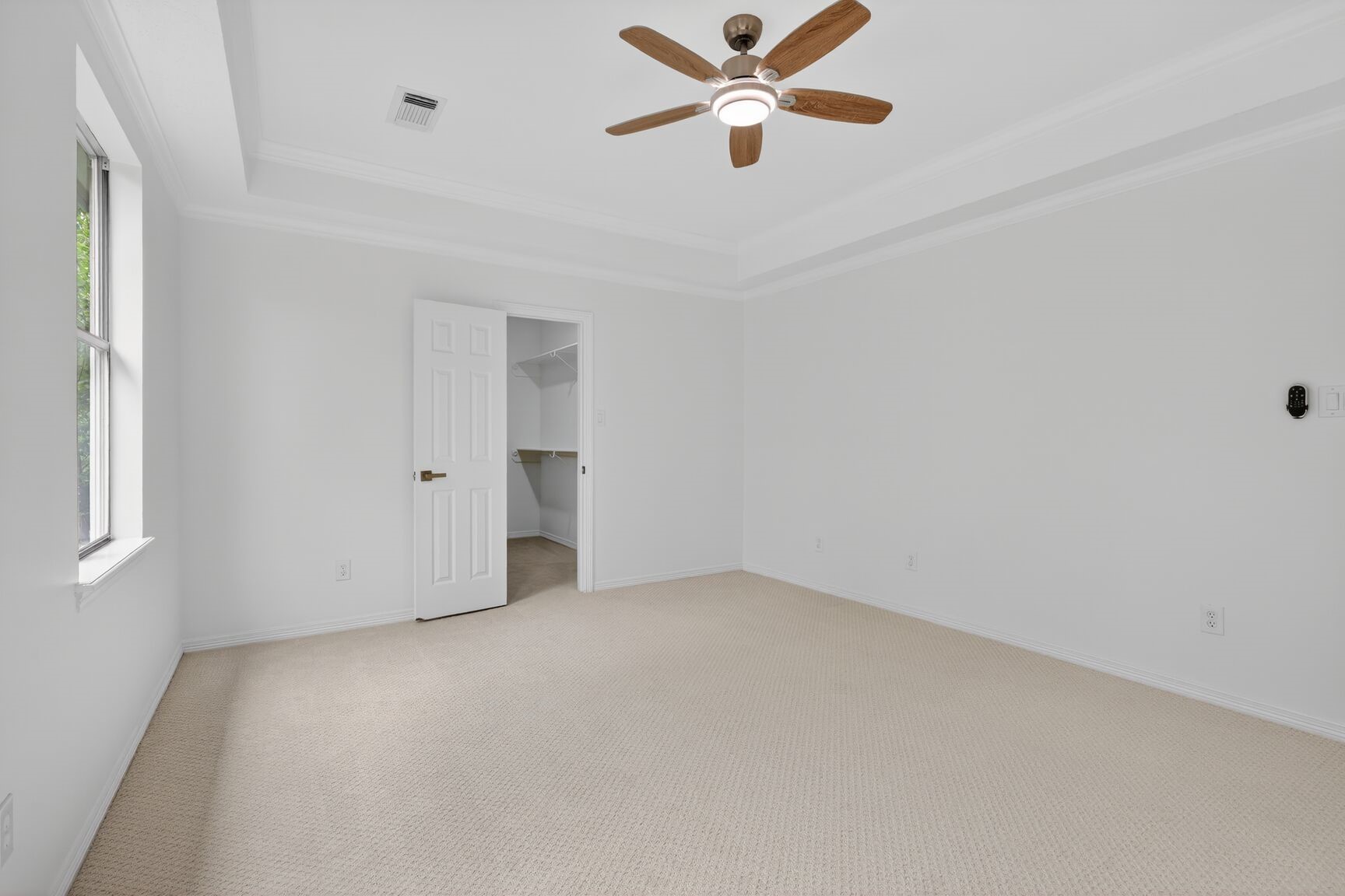 17519 Shelburne Lane Spring, TX 77379 - Photo 23 of 31 an empty room with windows and fan
