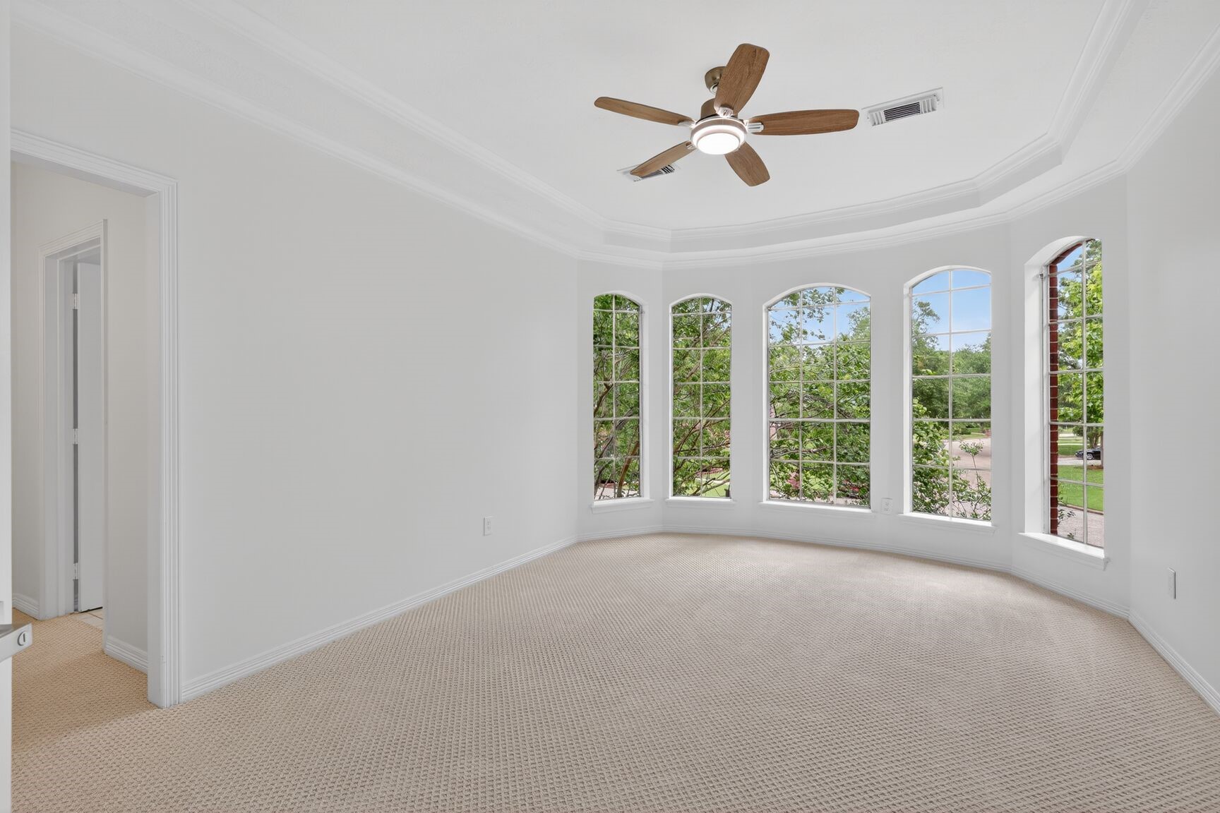 17519 Shelburne Lane Spring, TX 77379 - Photo 28 of 31 a view of a livingroom with a ceiling fan and a large window