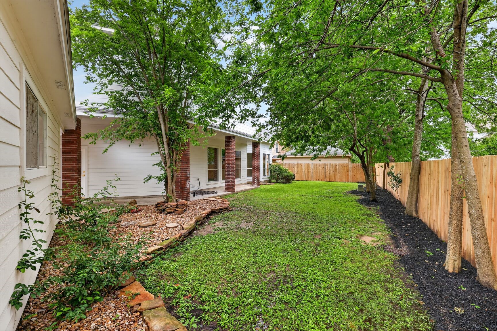 17519 Shelburne Lane Spring, TX 77379 - Photo 30 of 31 a view of a house with a yard