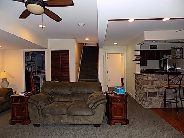 340 Thompson Run Road Pittsburgh, PA 15237 - Photo 13 of 23 Countless Amenities in this lower level Family Room include full kitchen w/ granite countertop bar, storage, and the private entrance is perfect for an in-law suite.