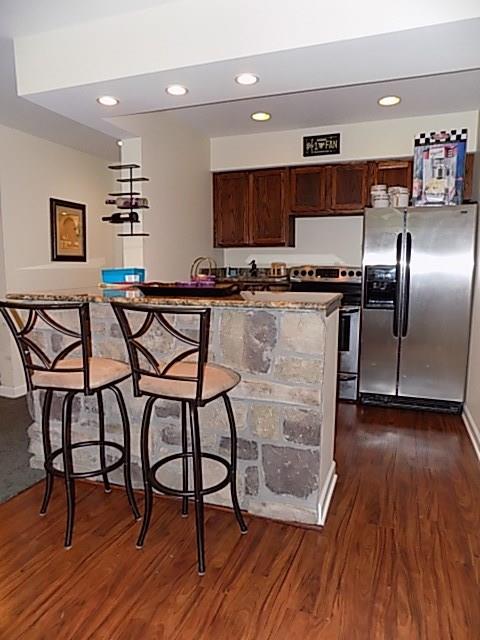 340 Thompson Run Road Pittsburgh, PA 15237 - Photo 16 of 23 2nd Kitchen is located adjacent to the Family Room and is fully equipped with a Stainless Steel Stove, Refrigerator, and Dishwasher. Stone bar compliments the gas place.