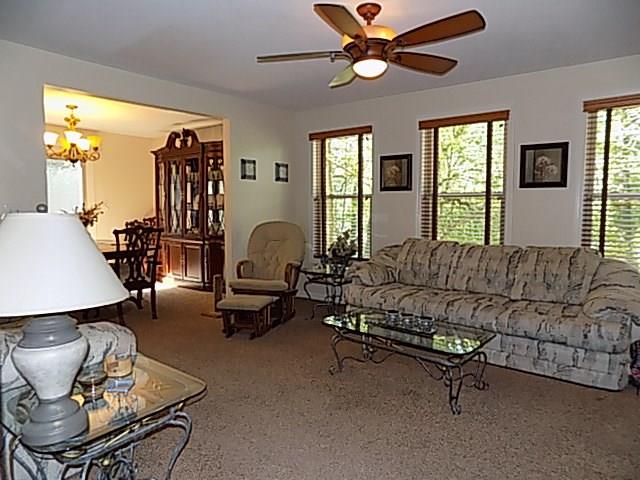 340 Thompson Run Road Pittsburgh, PA 15237 - Photo 6 of 23 Formal Living Room is adorned with a modern ceiling fan, 3 picture windows, and lots of room to entertain!
