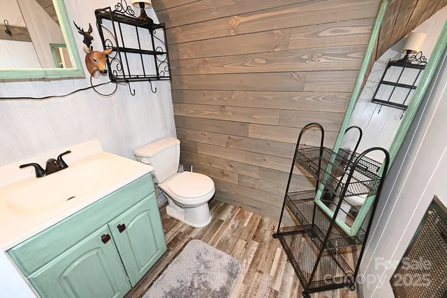 a bathroom with a toilet and a sink