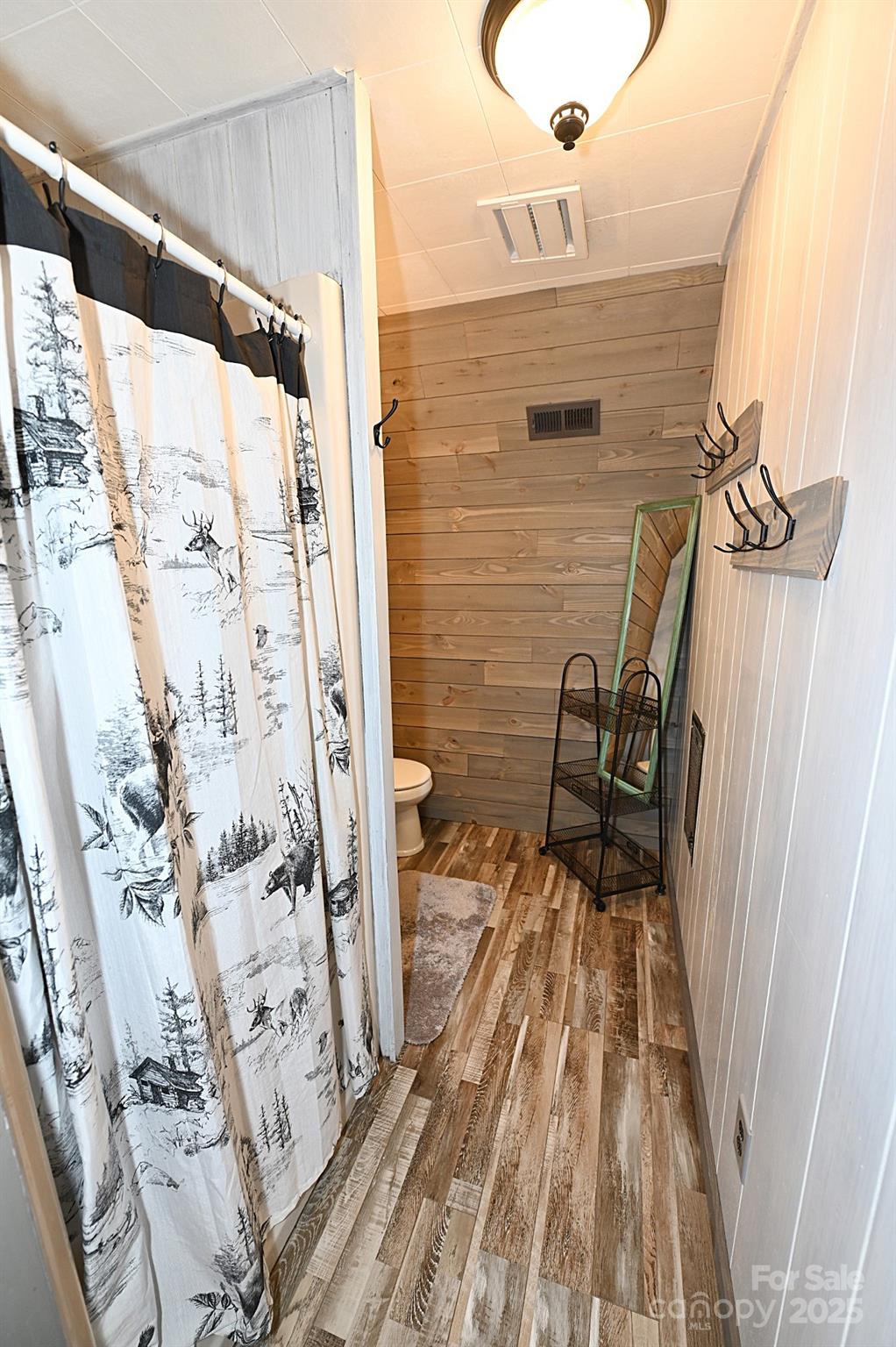 3430 Rose Creek Road Morganton, NC 28655 - Photo 12 of 48 a view of a balcony with wooden floor and bench