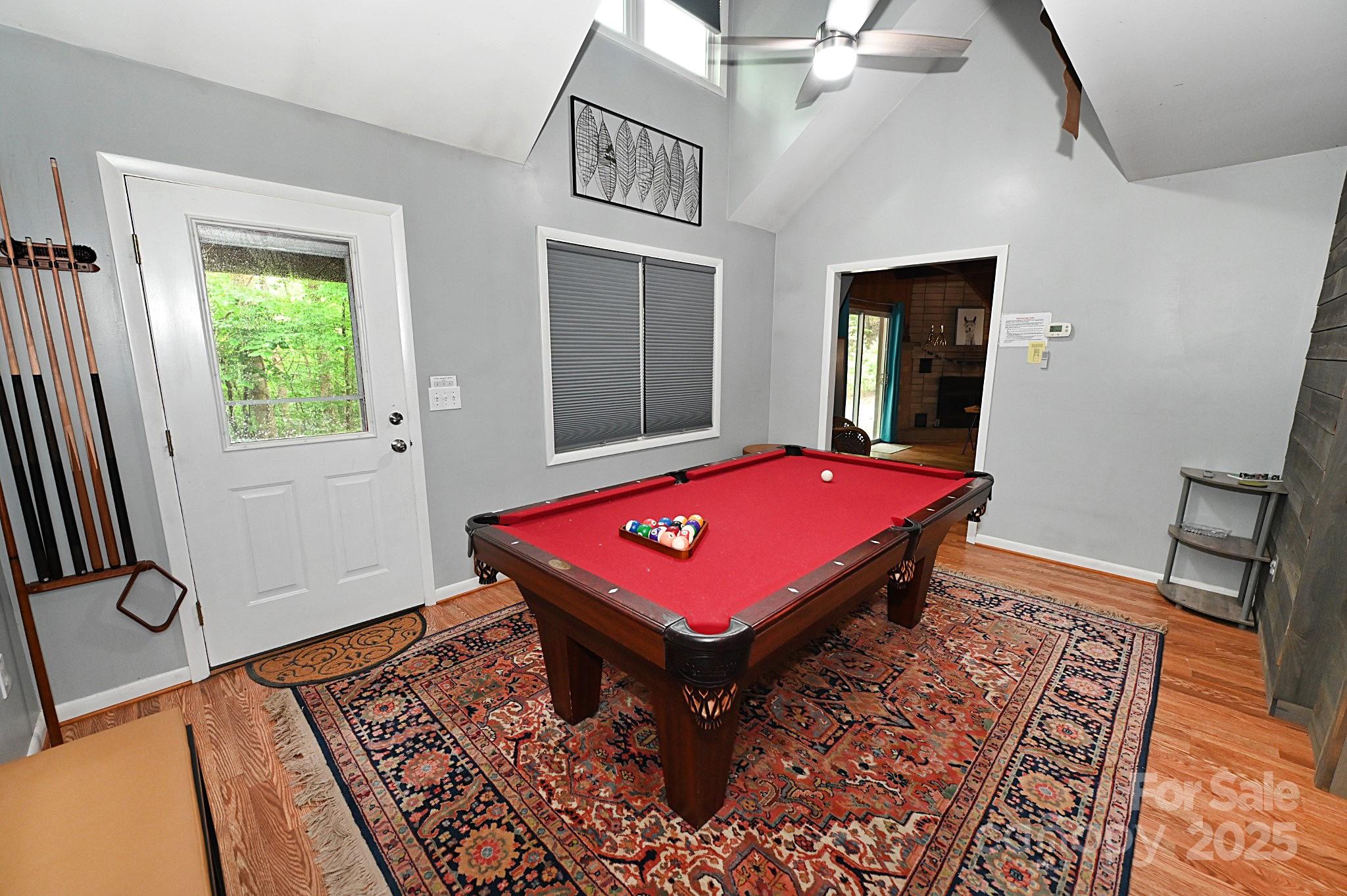 3430 Rose Creek Road Morganton, NC 28655 - Photo 18 of 48 a room with pool table and windows