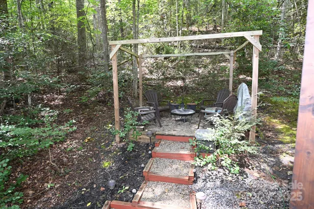 a bed room with a bed and a flat screen tv