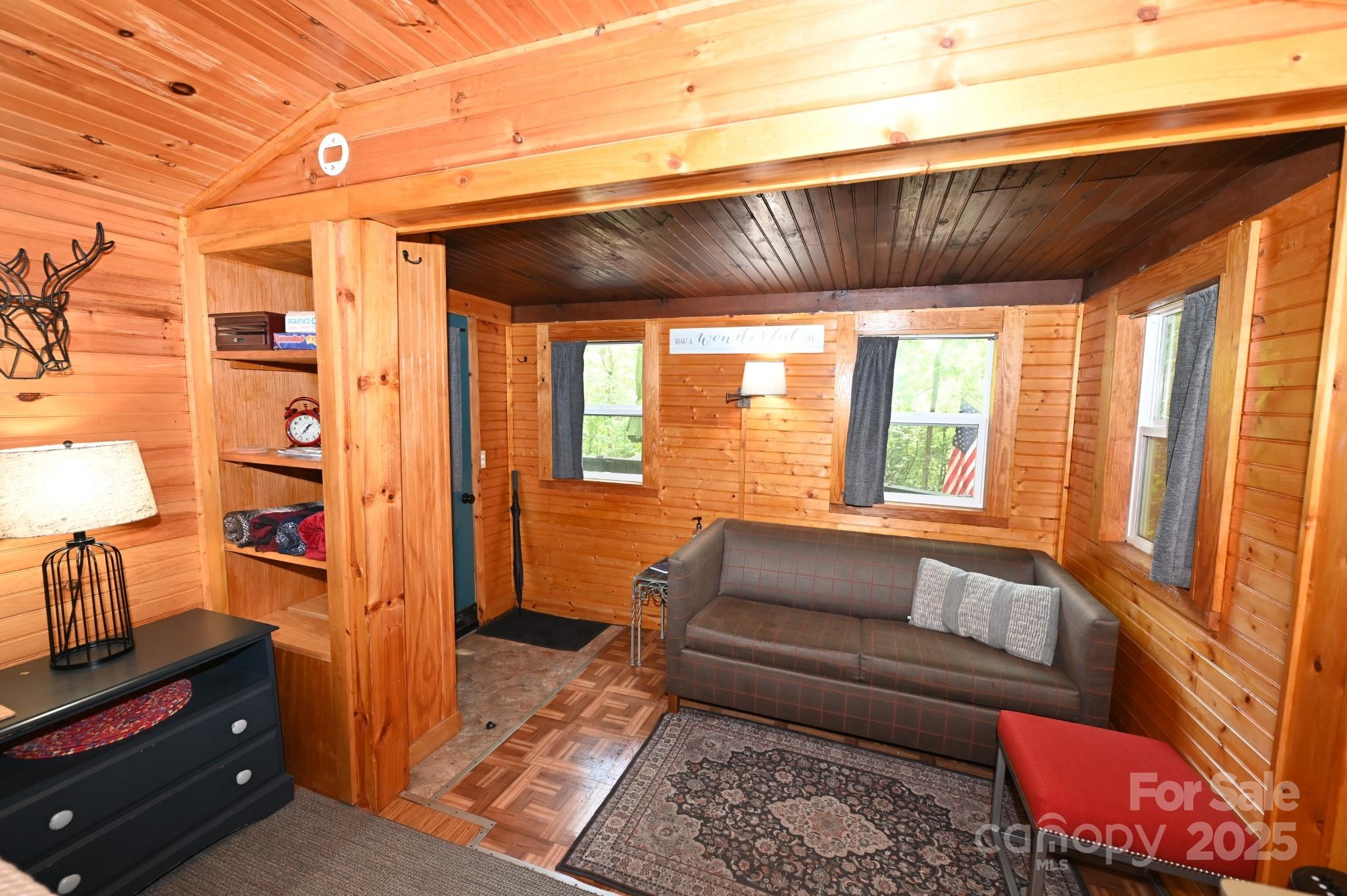3430 Rose Creek Road Morganton, NC 28655 - Photo 31 of 48 a living room with furniture and a bathtub