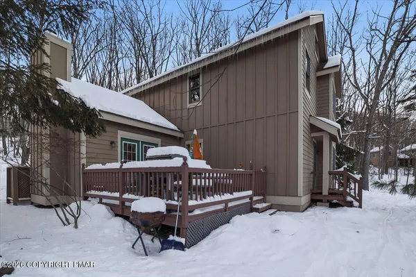 a view of a house with a snow