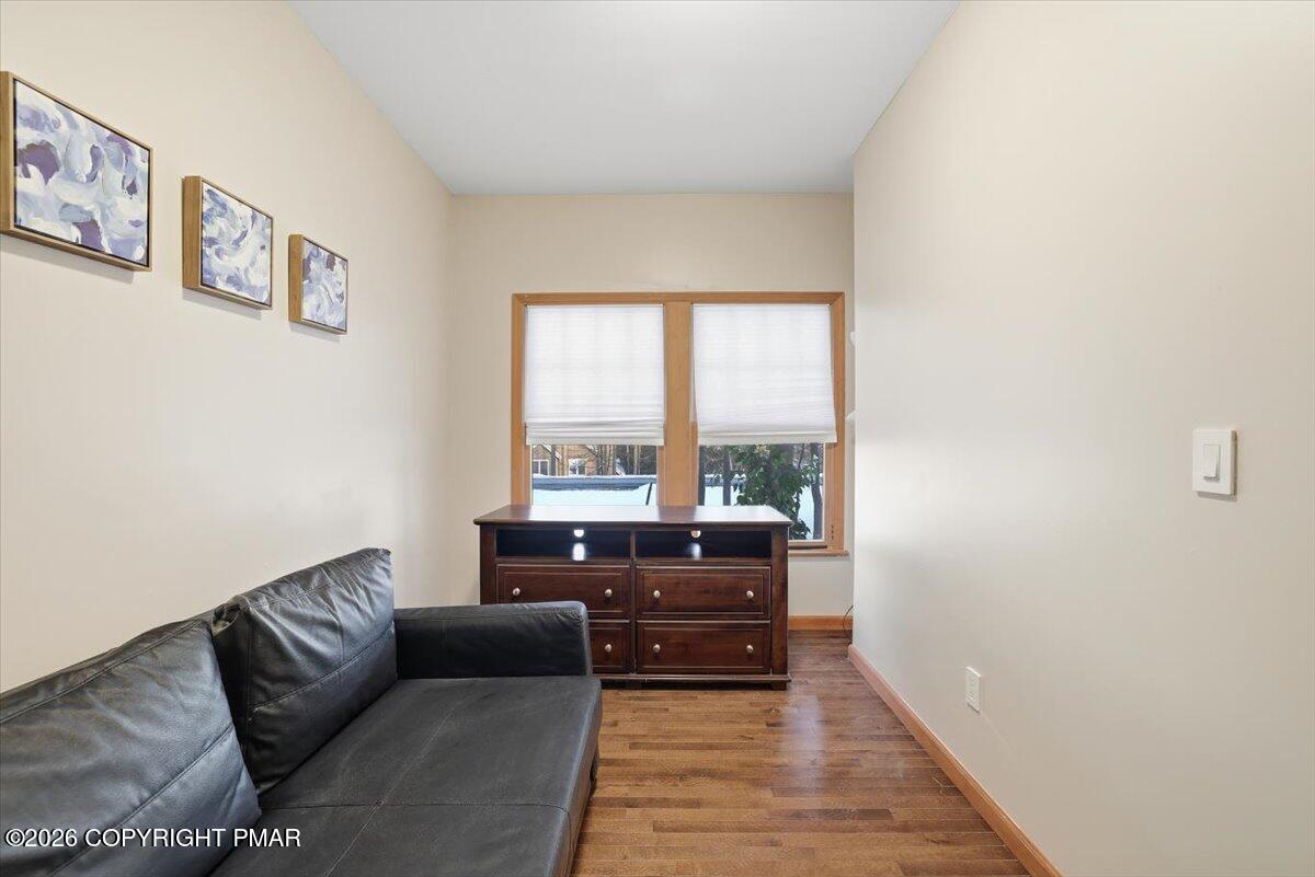 782 Lower Deer Valley Road Tannersville, PA 18372 - Photo 27 of 56 a living room with furniture and a window