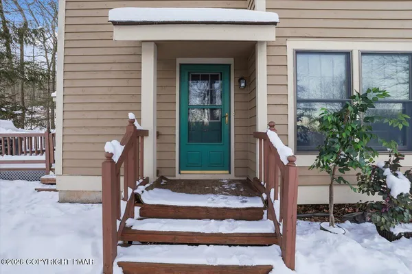a front view of a house with a porch