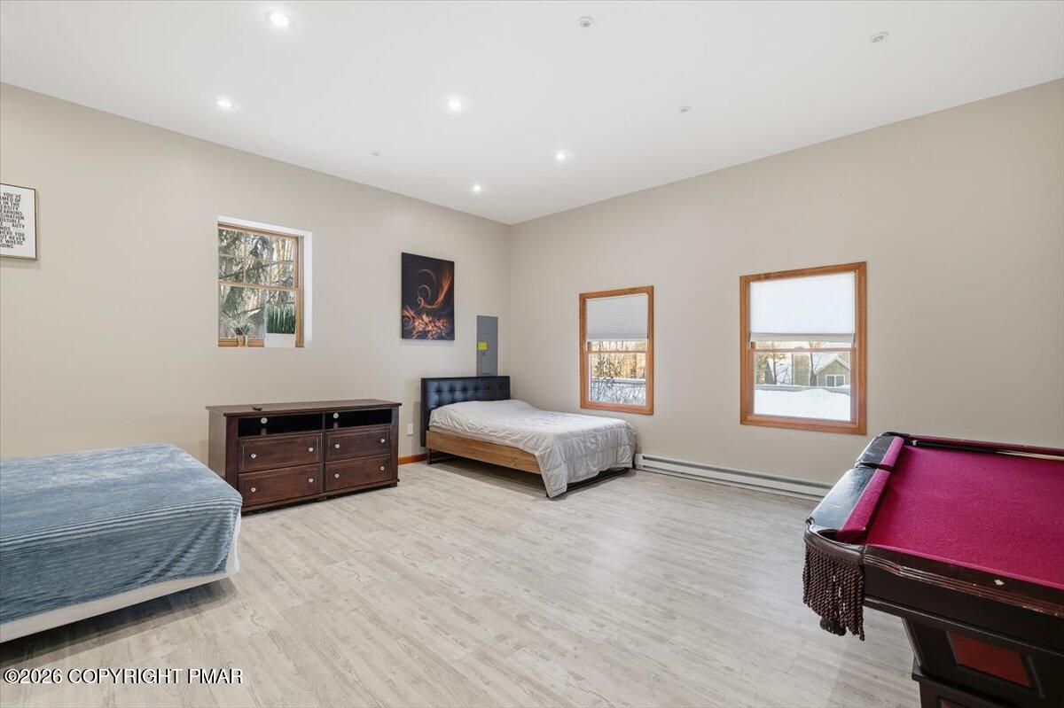 782 Lower Deer Valley Road Tannersville, PA 18372 - Photo 31 of 56 a bedroom with a bed and wooden floor