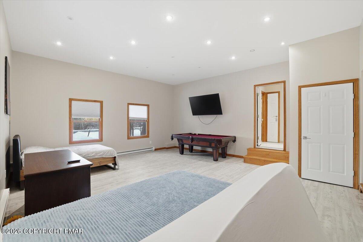 782 Lower Deer Valley Road Tannersville, PA 18372 - Photo 32 of 56 a living room with furniture a piano and a flat screen tv