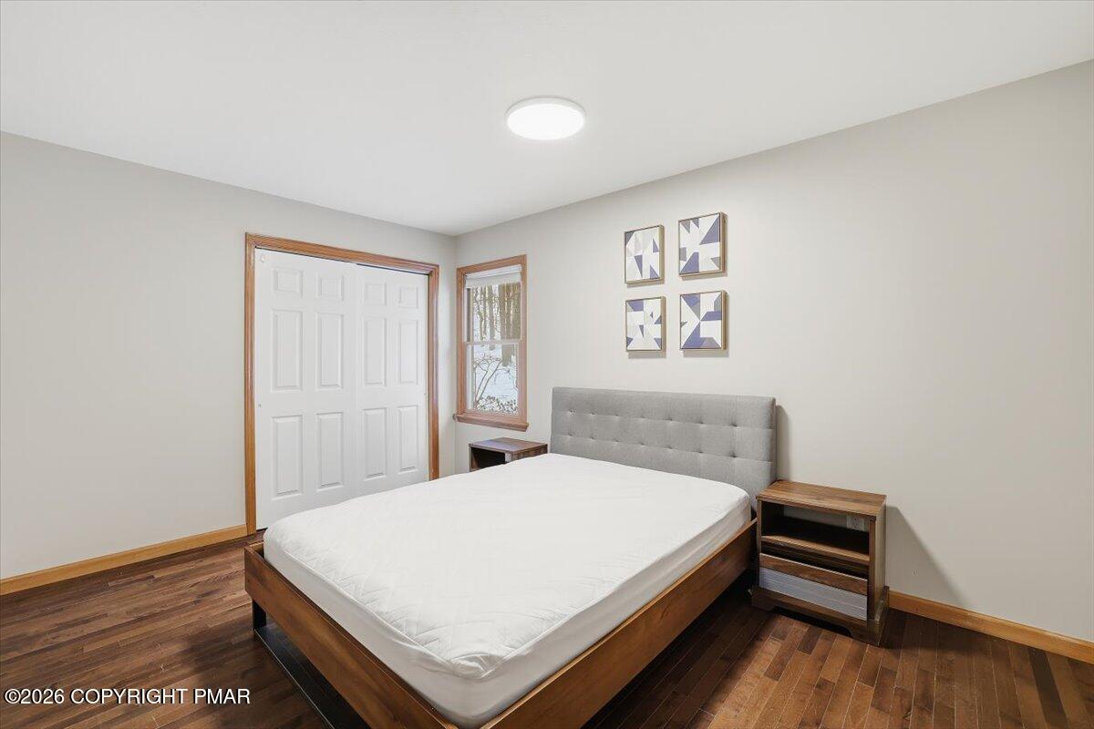 782 Lower Deer Valley Road Tannersville, PA 18372 - Photo 38 of 56 a bed room with a bed and a night stand