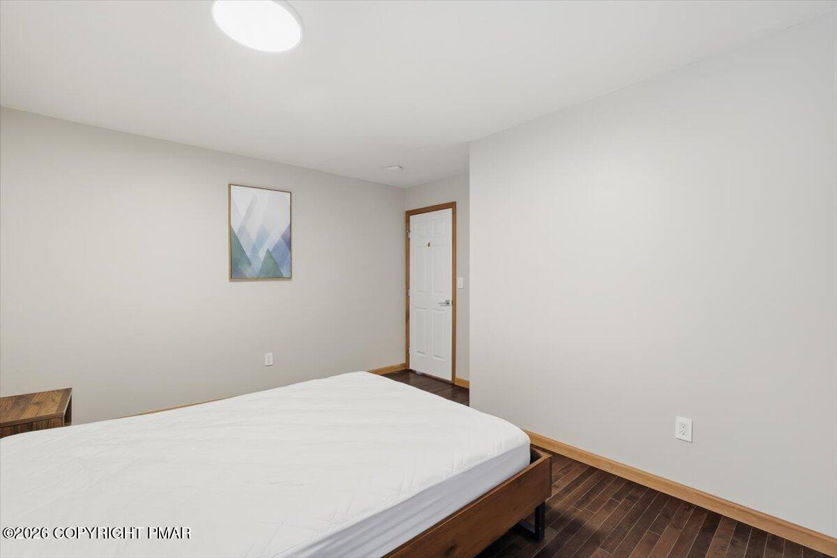 782 Lower Deer Valley Road Tannersville, PA 18372 - Photo 39 of 56 a bedroom with a bed and a window