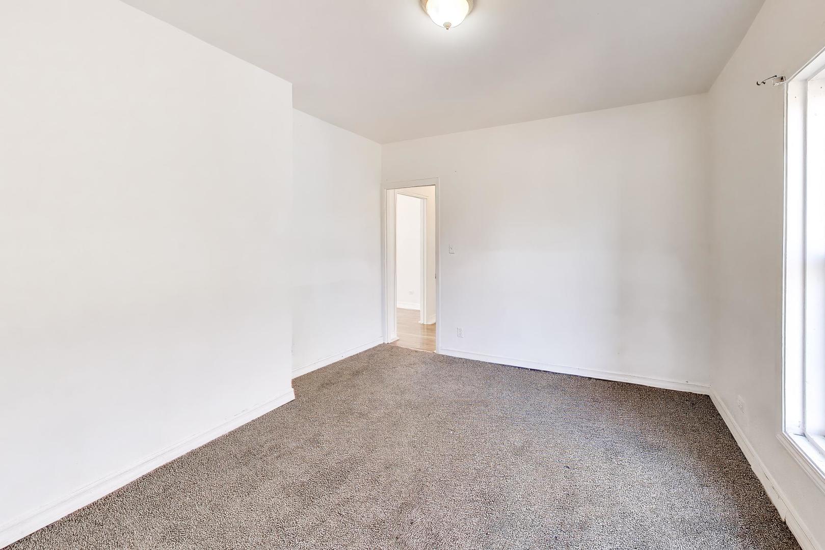 6853 South Perry Avenue Chicago, IL 60621 - Photo 20 of 28 a view of an empty room