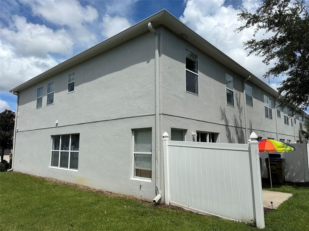 2510 Hassonite Street Kissimmee, FL 34744 - Photo 14 of 22 a view of a house with a yard