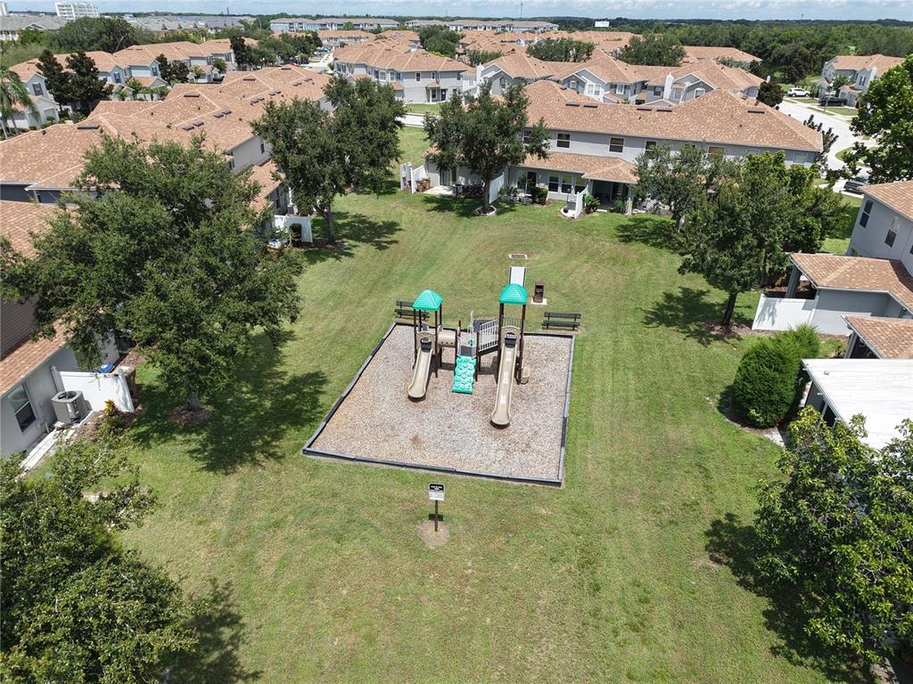 2510 Hassonite Street Kissimmee, FL 34744 - Photo 20 of 22 an aerial view of a house with swimming pool outdoor seating and yard