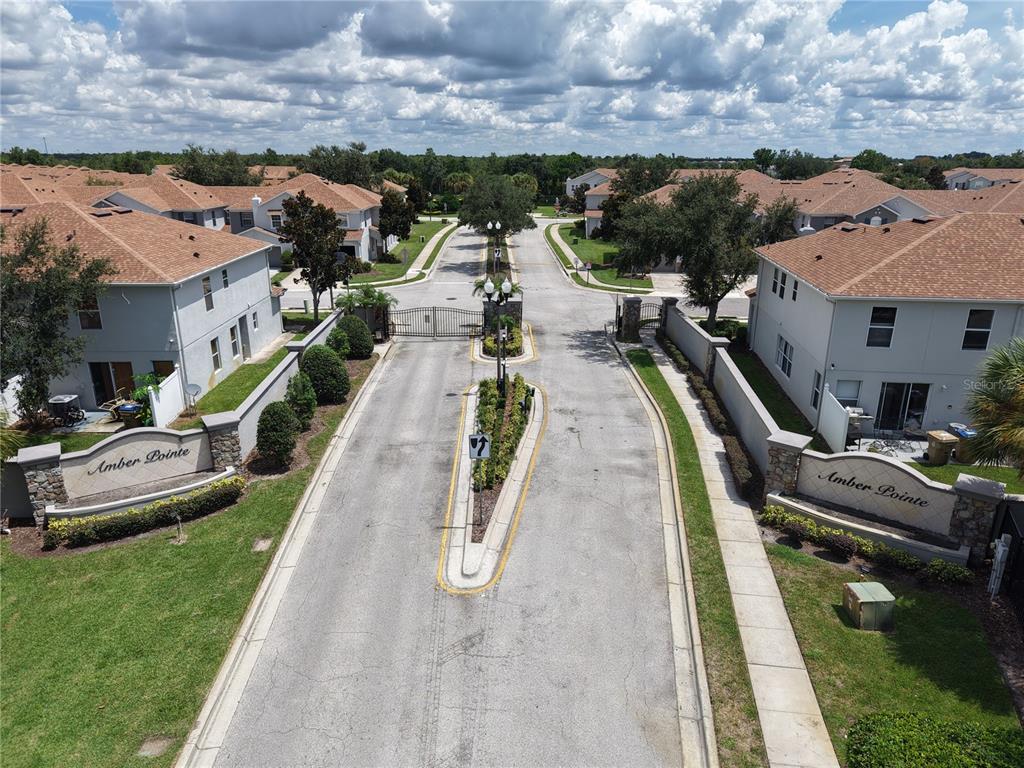 2510 Hassonite Street Kissimmee, FL 34744 - Photo 22 of 22 a view of multiple houses with outdoor space