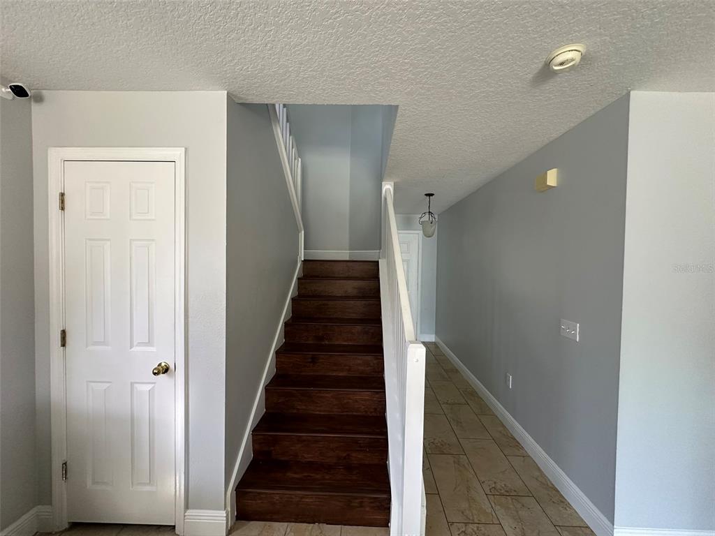 2510 Hassonite Street Kissimmee, FL 34744 - Photo 6 of 22 a view of a hallway with entryway