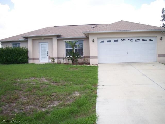 18571 Geranium Road Fort Myers, FL 33967 - Photo 1 of 1 a view of a house with a yard and sitting area