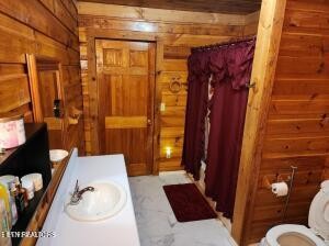 2880 Fairview Road Madisonville, TN 37354 - Photo 21 of 37 a bathroom with a sink and toilet