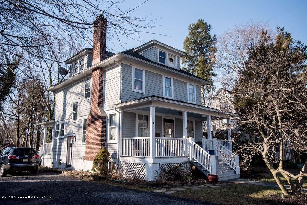89 Pinckney Road Red Bank, NJ 07701 - Photo 2 of 26 a front view of a house with a yard