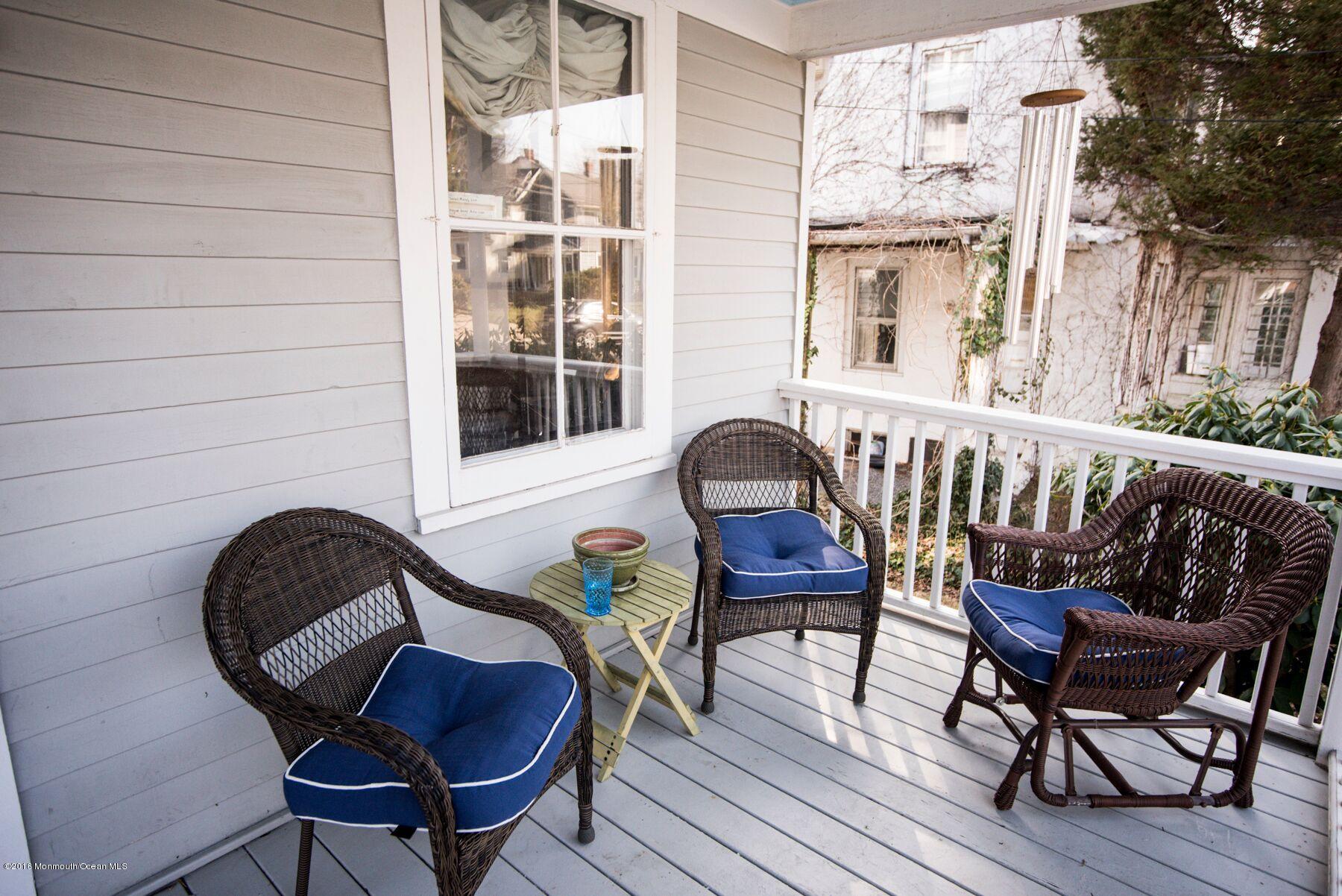 89 Pinckney Road Red Bank, NJ 07701 - Photo 23 of 26 a table and chairs in a patio