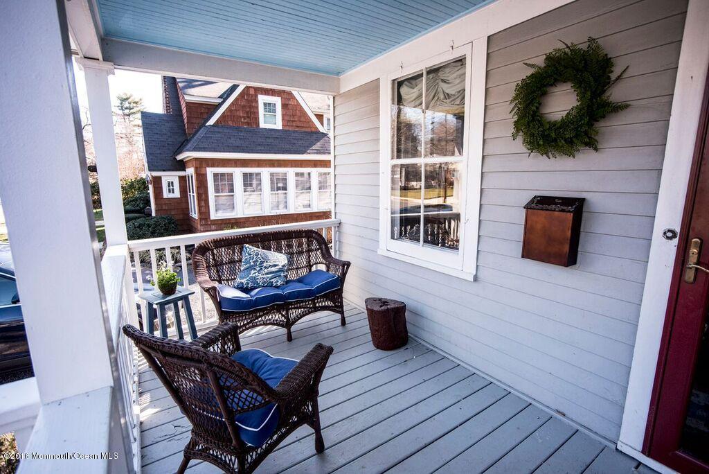 89 Pinckney Road Red Bank, NJ 07701 - Photo 24 of 26 a view of a balcony with furniture and flat screen tv